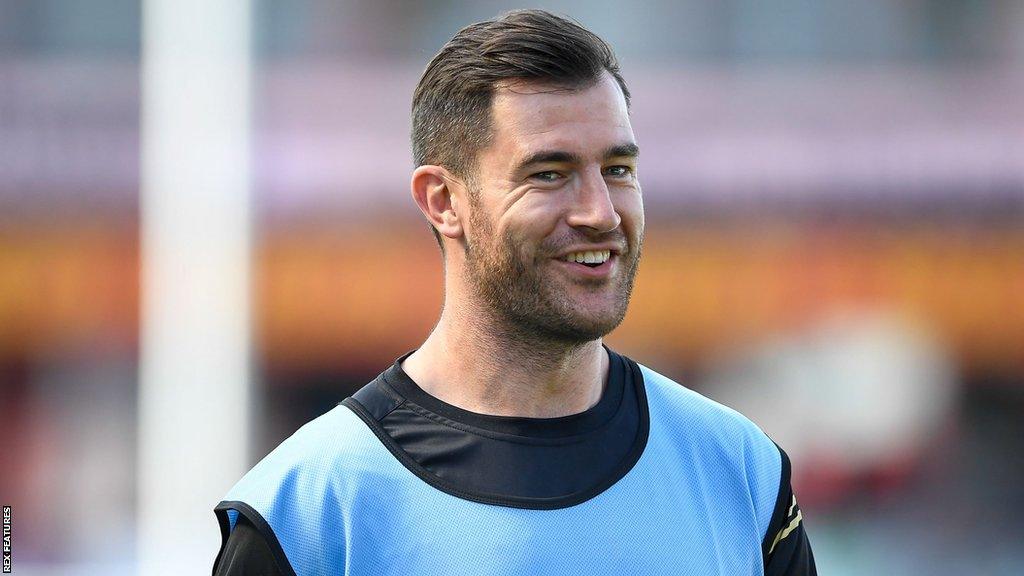 Mark Atkinson on the field during a pre-match warm-up for Gloucester this season