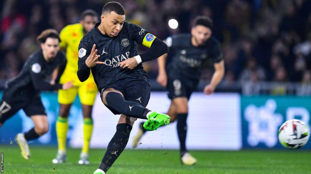 Kylian Mbappe scores a penalty for PSG at Nantes on Saturday