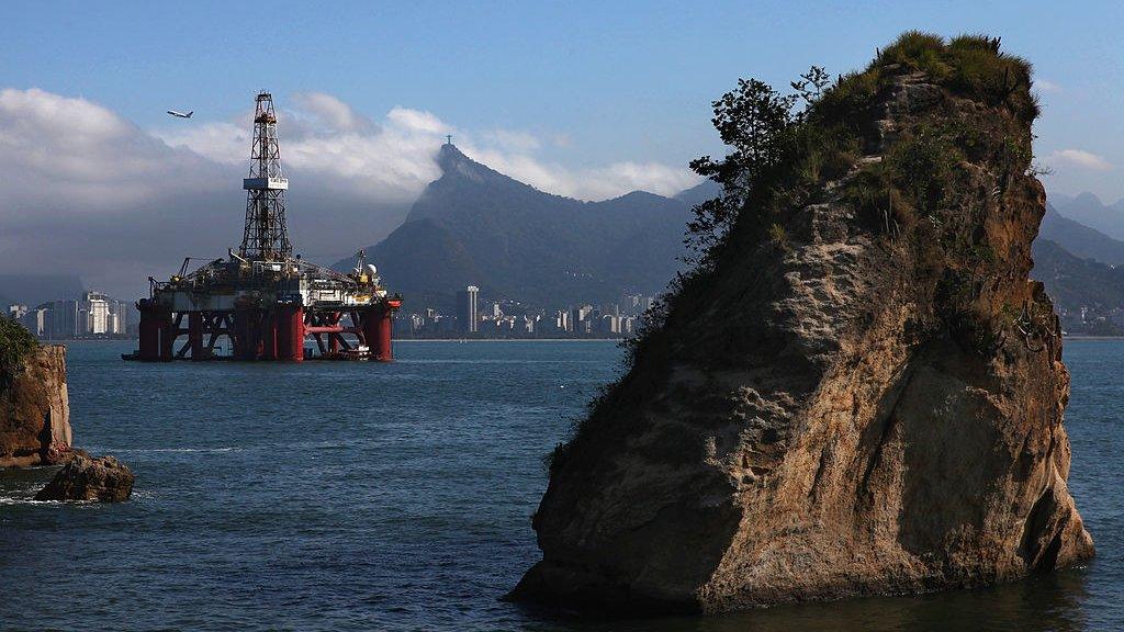 Oil drilling platform in front of Sugarloaf Mountain