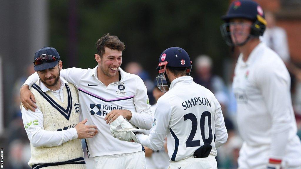 Middlesex celebrate a wicket