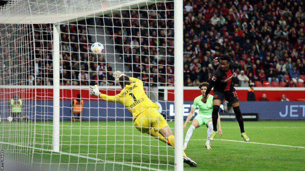 Nathan Tella of Bayer Leverkusen scores for Bayern Leverkusen