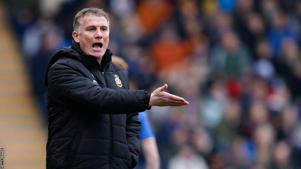 Wrexham manager Phil Parkinson gestures at officials