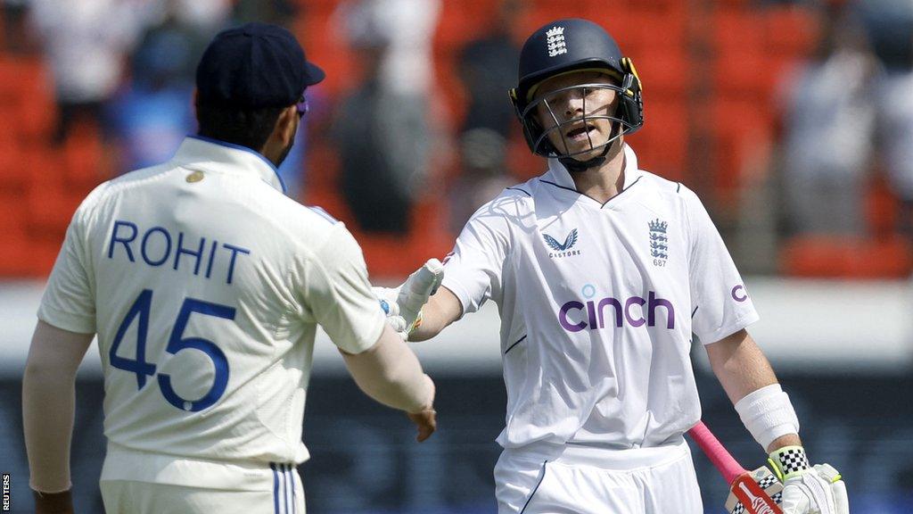 Ollie Pope shakes hands with Rohit Sharma after being dismissed