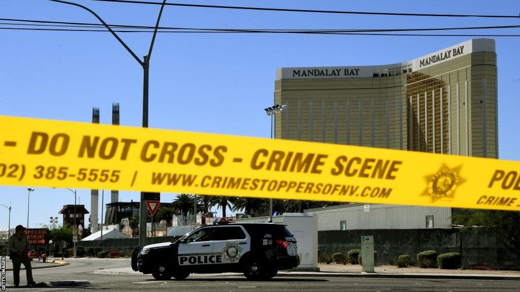 Crime scene tape shuts a road outside Mandalay Bay hotel