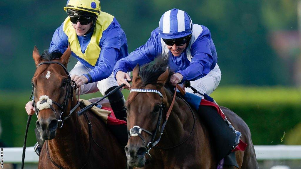 Jim Crowley riding Hukum (blue/white) win The Racehorse Lotto Brigadier Gerard Stakes