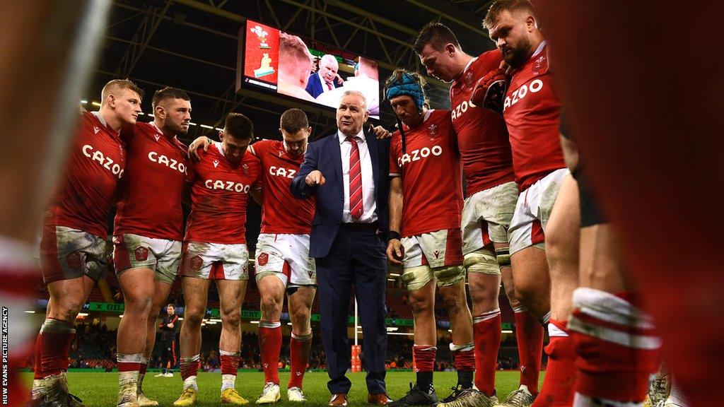 Wales players in a huddle after a 39-34 defeat against Australia