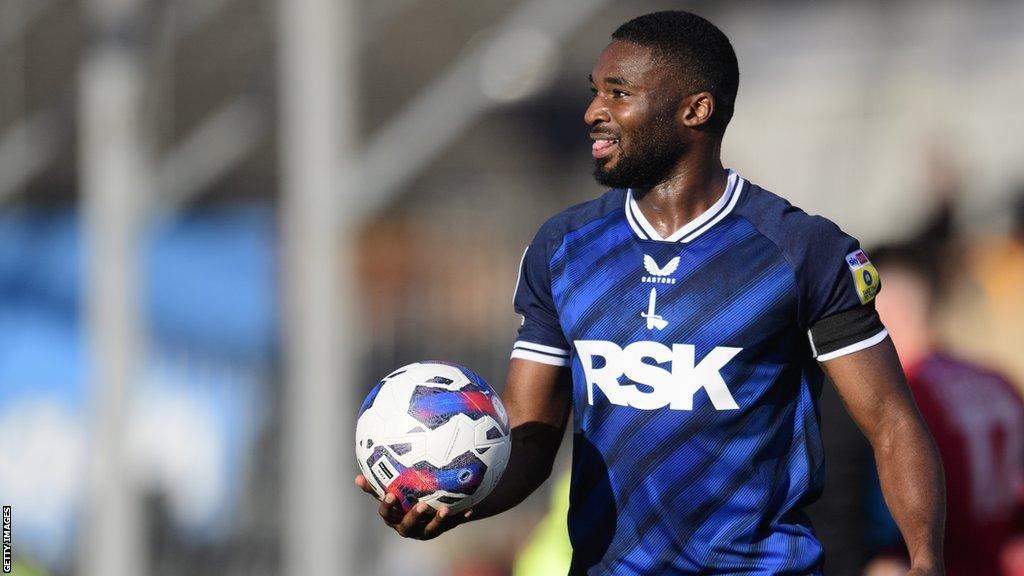 Mandela Egbo prepares to take a throw-in