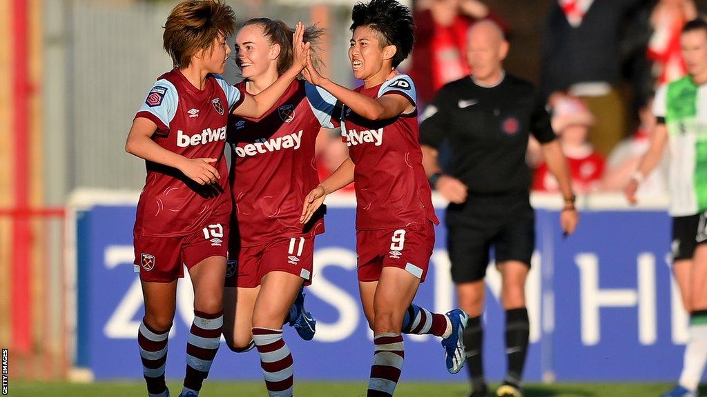 Riko Ueki, Honoka Hayashi and Izzy Atkinson celebrate