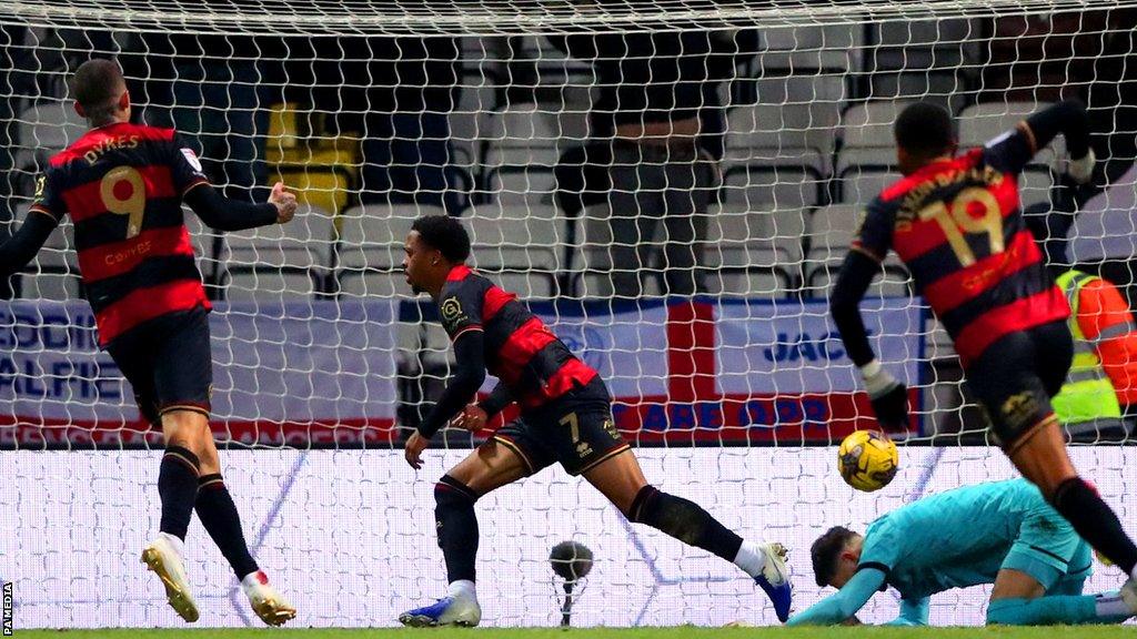 Chris Willock (centre) peels away after scoring QPR's second goal against Preston