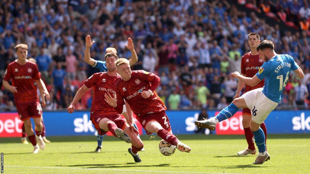 Joel Senior made a key block from Stockport's Jack Stretton to keep Carlisle in the League Two play-off final at Wembley