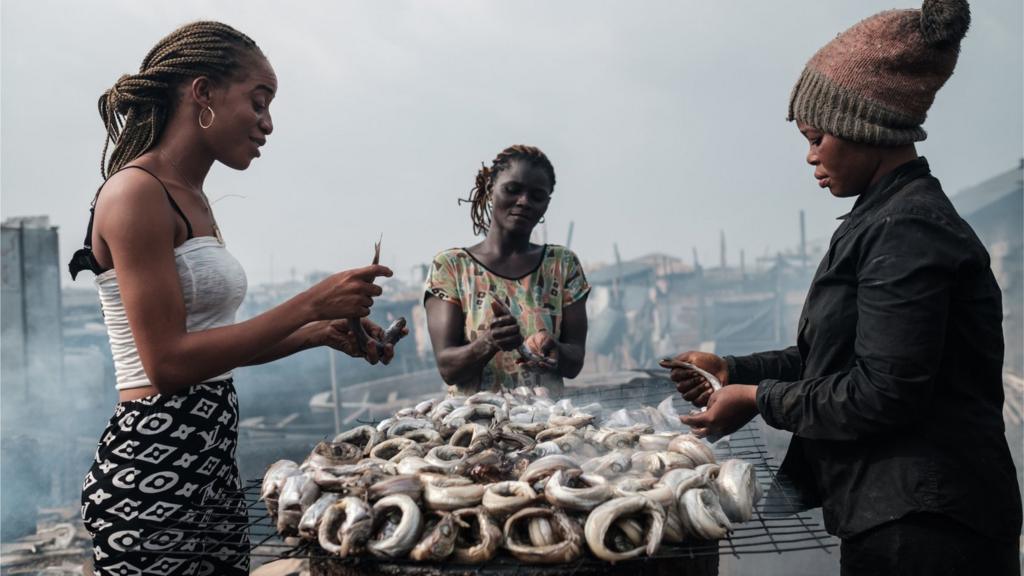 Women smoke fish in Port Harcourt