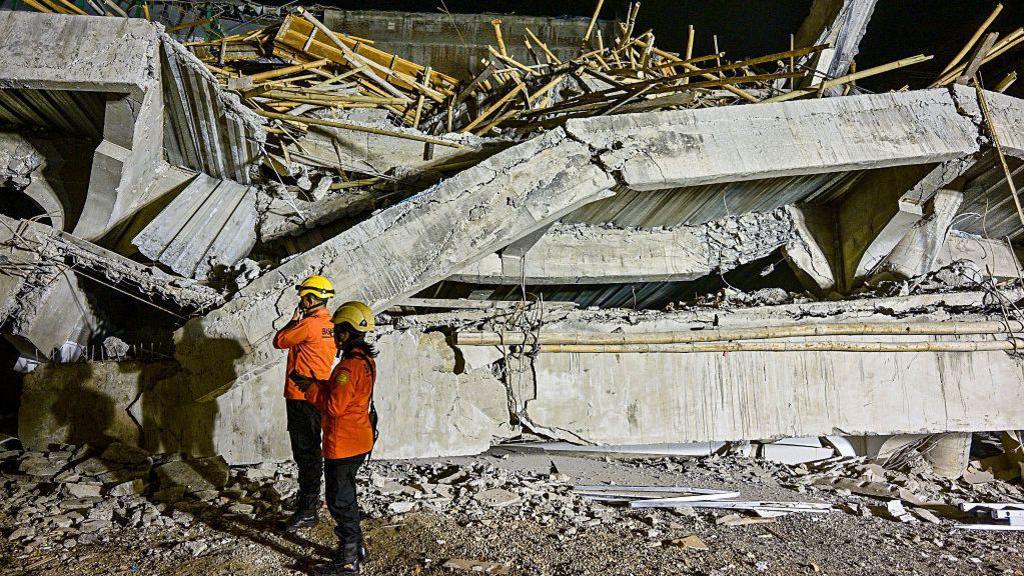 Indonesia: Rush to rescue dozens still trapped as boarding school collapse  kills three - BBC News