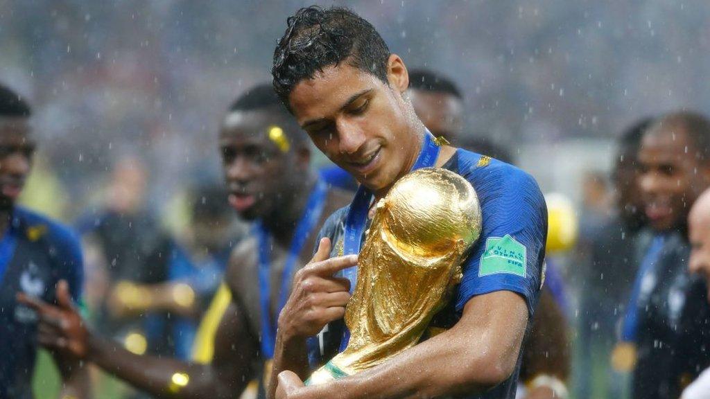 Raphael Varane of France looks at the World Cup trophy after the 2018 Fifa World Cup Final between France and Croatia at Luzhniki Stadium on July 15, 2018 in Moscow, Russia.