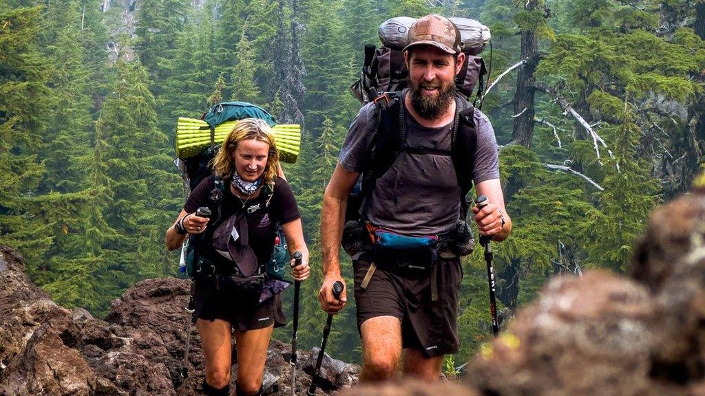 The couple hiking