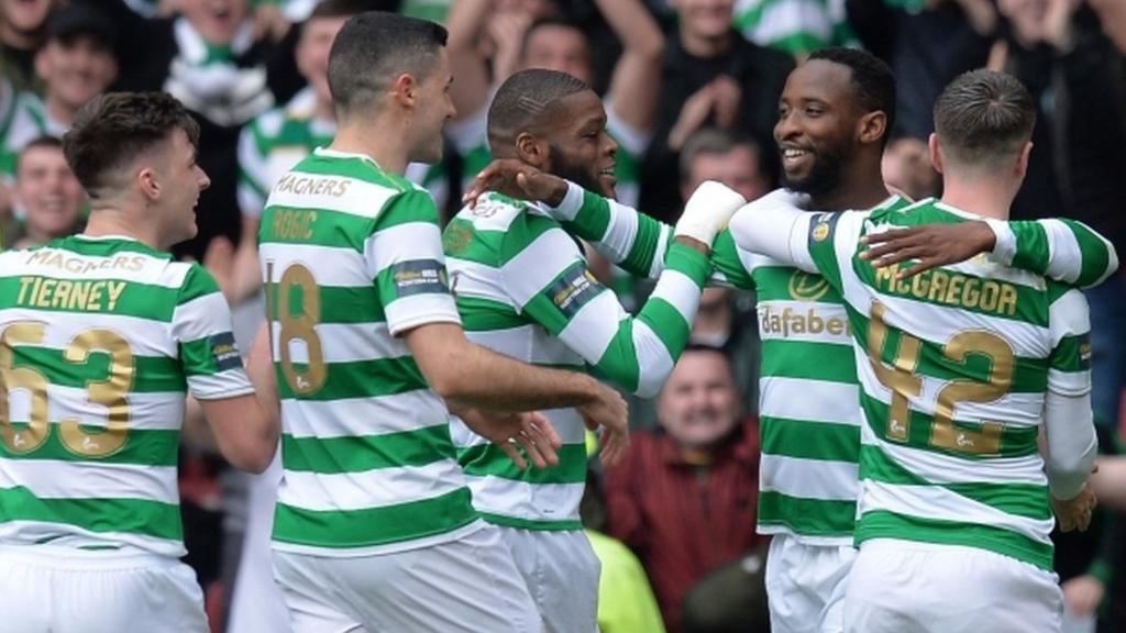 Celtic celebrate Moussa Dembele's penalty