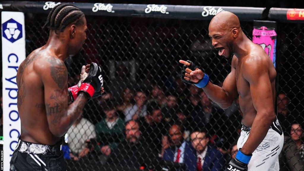 Michael 'Venom' Page in action against Kevin Holland at UFC 299 in Miami, Florida