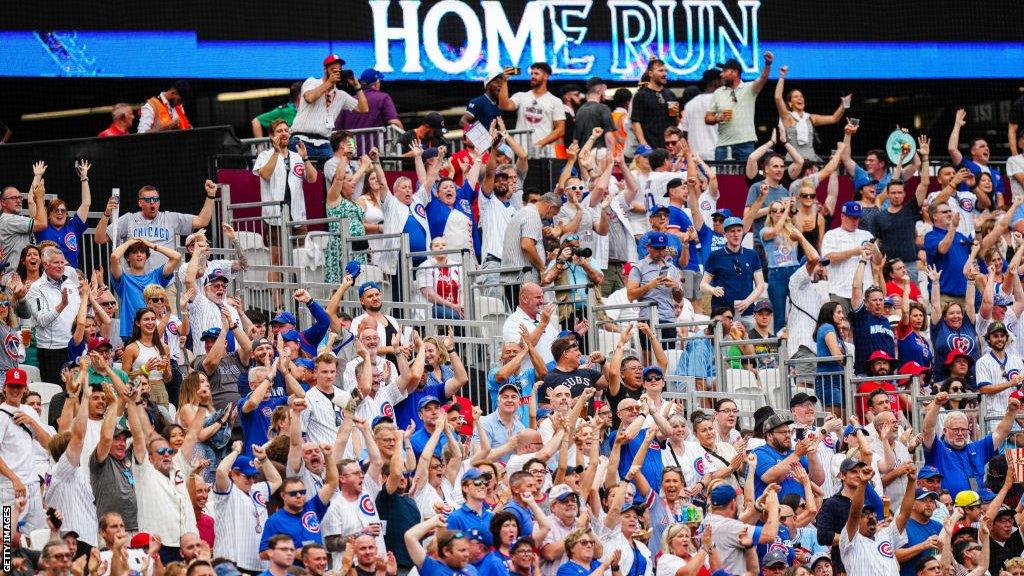 Chicago Cubs fans celebrate their team's win during the MLB London Series