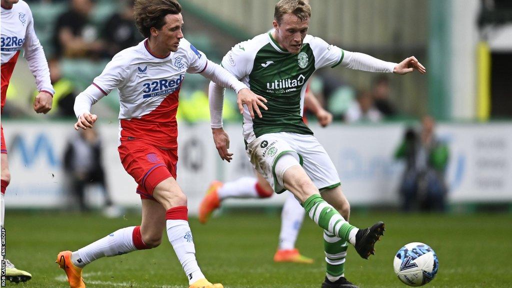 Alex Lowry (left) in action for Rangers