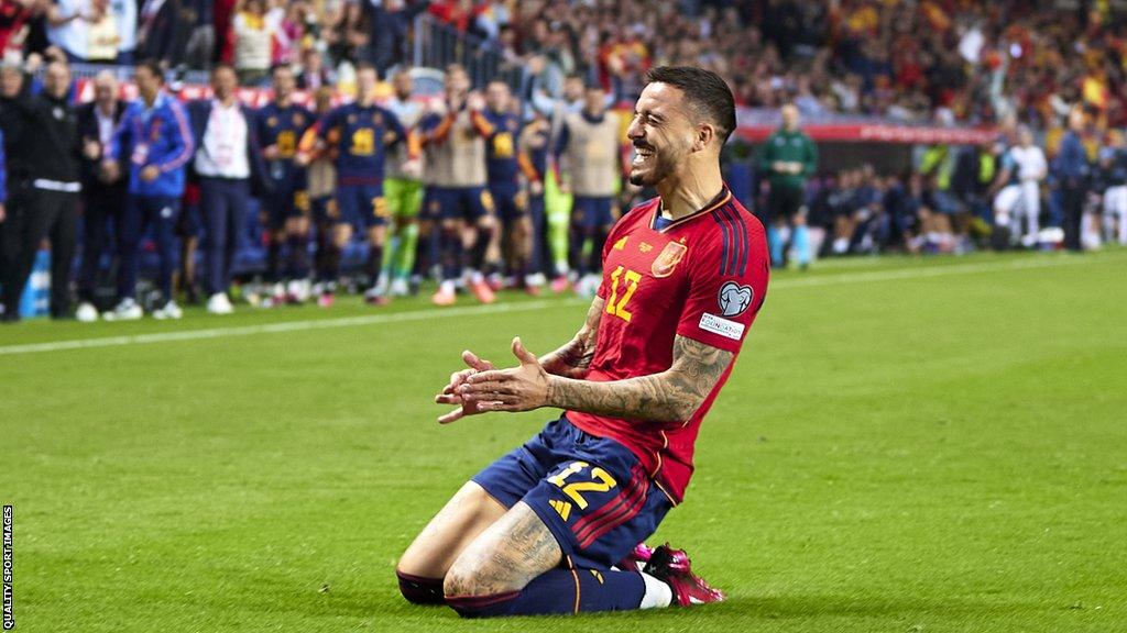 Joselu celebrates scoring for Spain