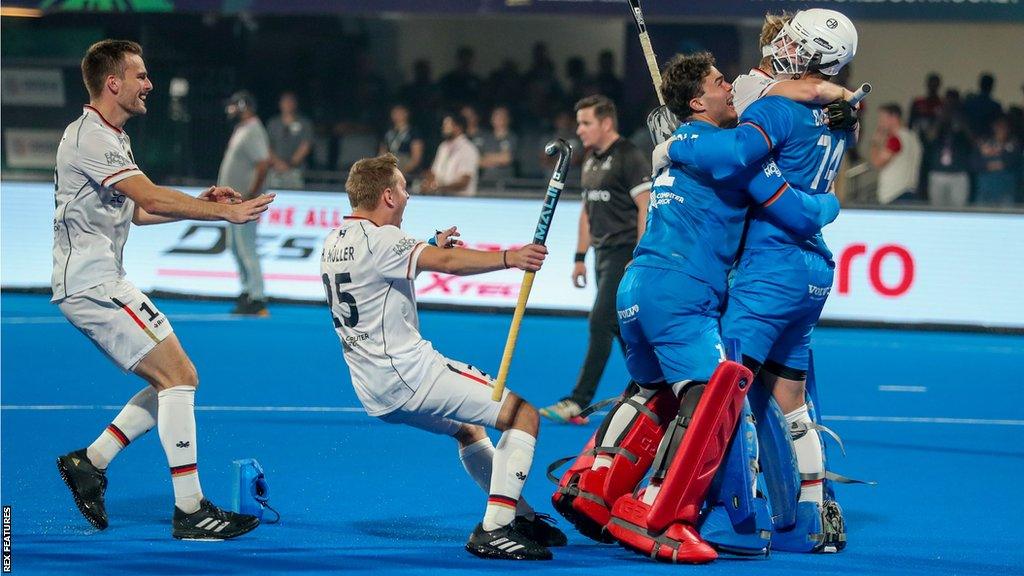 Goalkeeper Jean-Paul Danneberg (R) of Germany celebrates with teammate