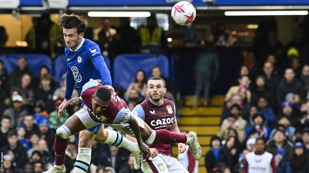 Ben Chilwell pushes Ashley Young