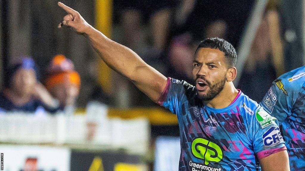 Kruise Leeming celebrates scoring for Wigan against Castleford