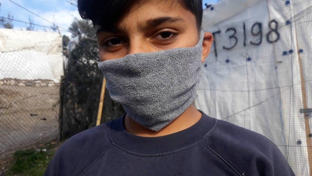 Boy wearing mask