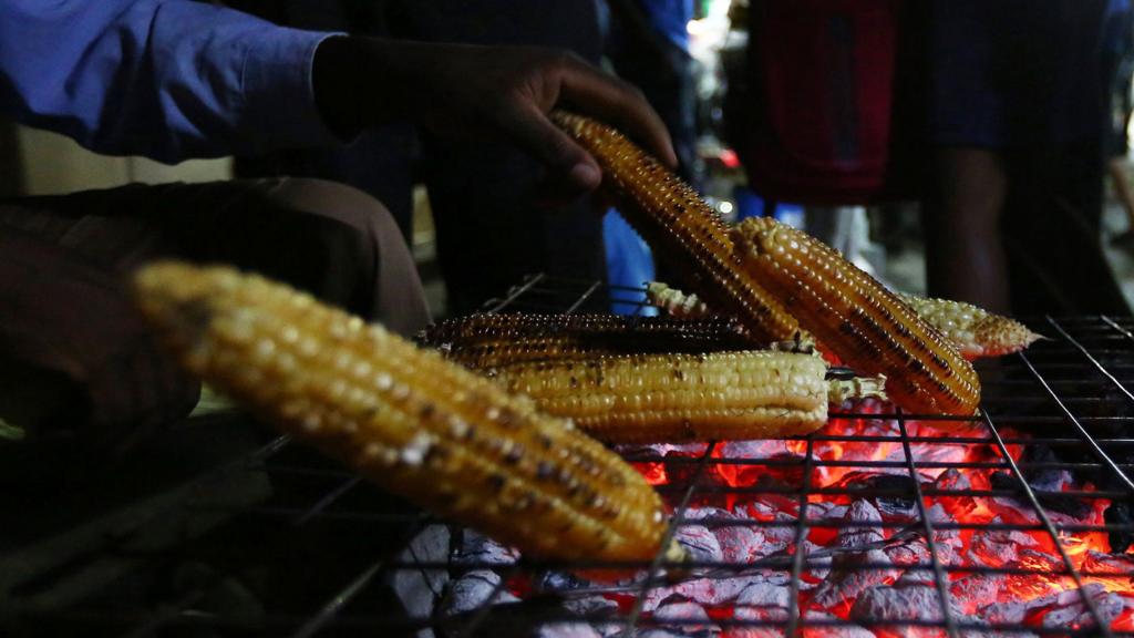 Maize being cooked over coals in Zimbabwe - November 2016