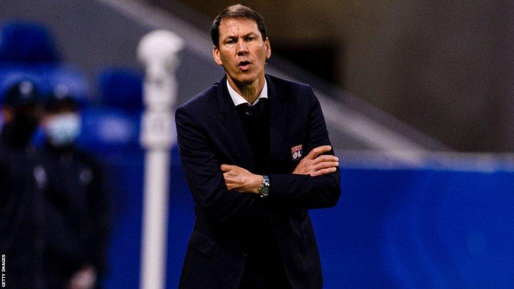 Rudi Garcia with his arms folded on the touchline