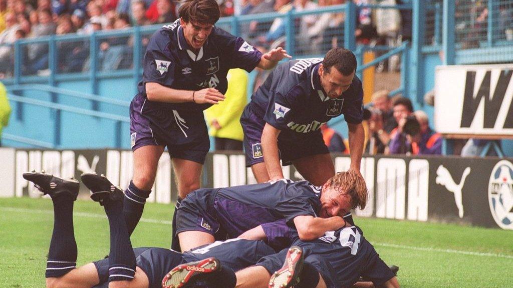 Jurgen Klinsmann celebrates for Tottenham with his iconic dive