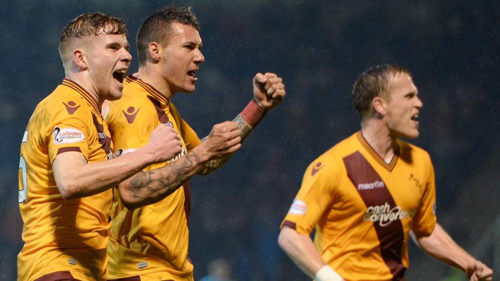 Motherwell celebrate their equaliser through Marvin Johnson (centre)