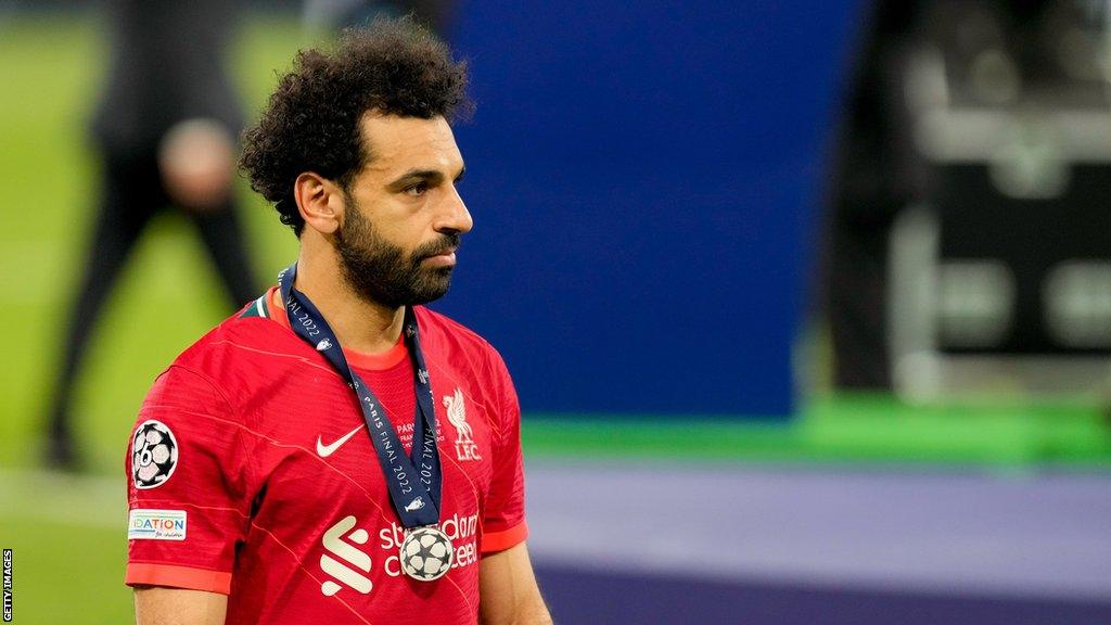 Liverpool's Mohamed Salah looks dejected after losing the 2022 Champions League final to Real Madrid