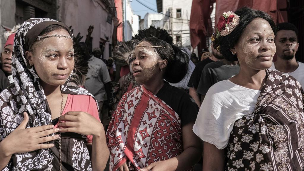 Performers parade through the street to kick off the 16th International African music festival 'Sauti za Busara in Stone town on Tanzania's semi-autonomous archipelago Zanzibar on February 7, 2019.