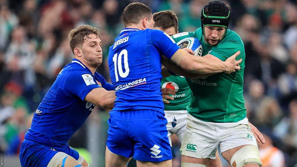 Italy duo Lorenzo Cannone and Italy's Paolo Garbisi attempt to halt Ireland's Caelan Doris