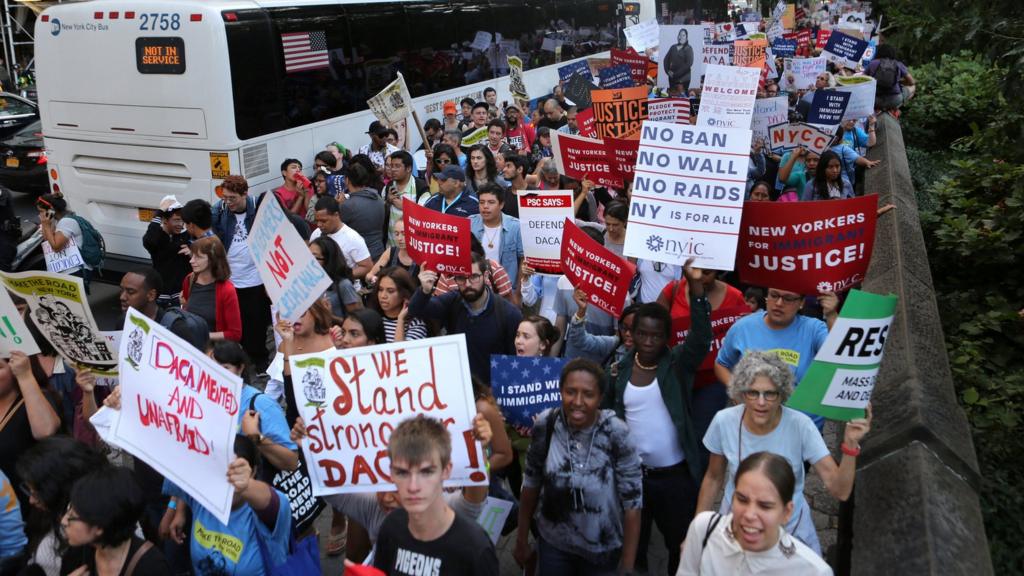 People march and chant slogans against U.S. President Donald Trump"s proposed end of the DACA program that protects immigrant children from deportation at a protest in New York City, U.S., August 30, 2017