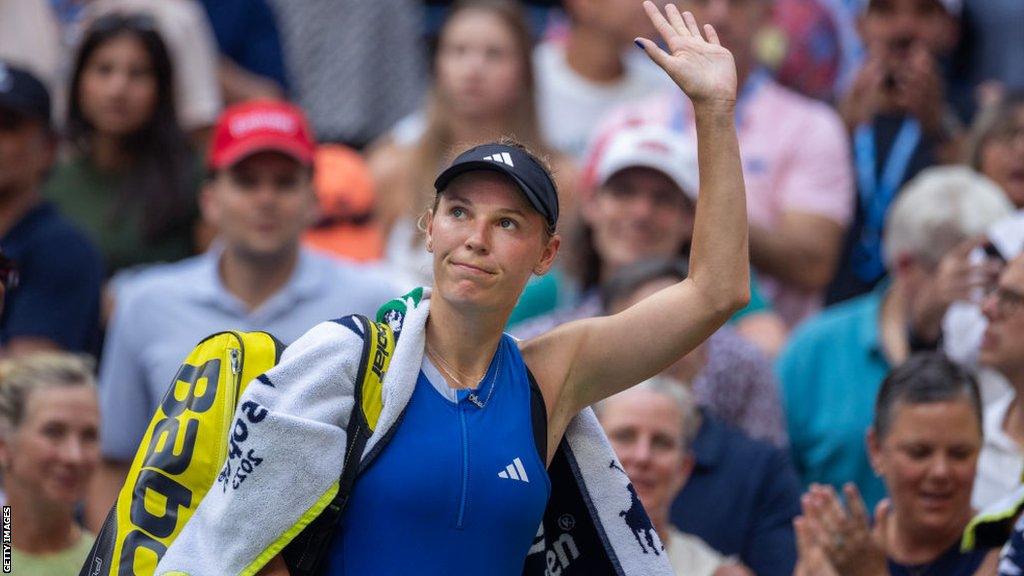 Caroline Wozniacki of Denmark leaves the court after her loss against Coco Gauff