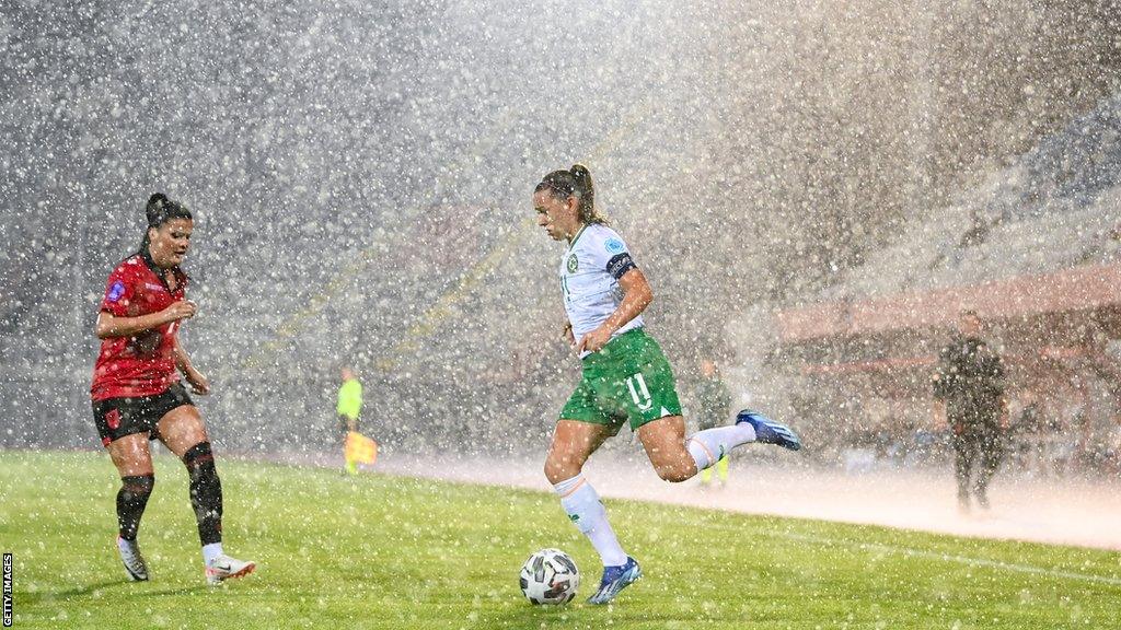 Eileen Gleeson (just visible on the right) says she changed her mind about taking the Republic of Ireland job in the torrential rain in Albania