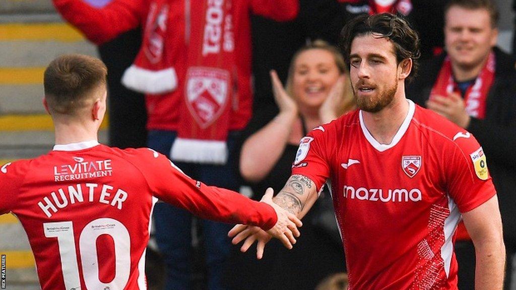 Cole Stockton (right) ended last season by scoring seven goals in his final four games for Morecambe