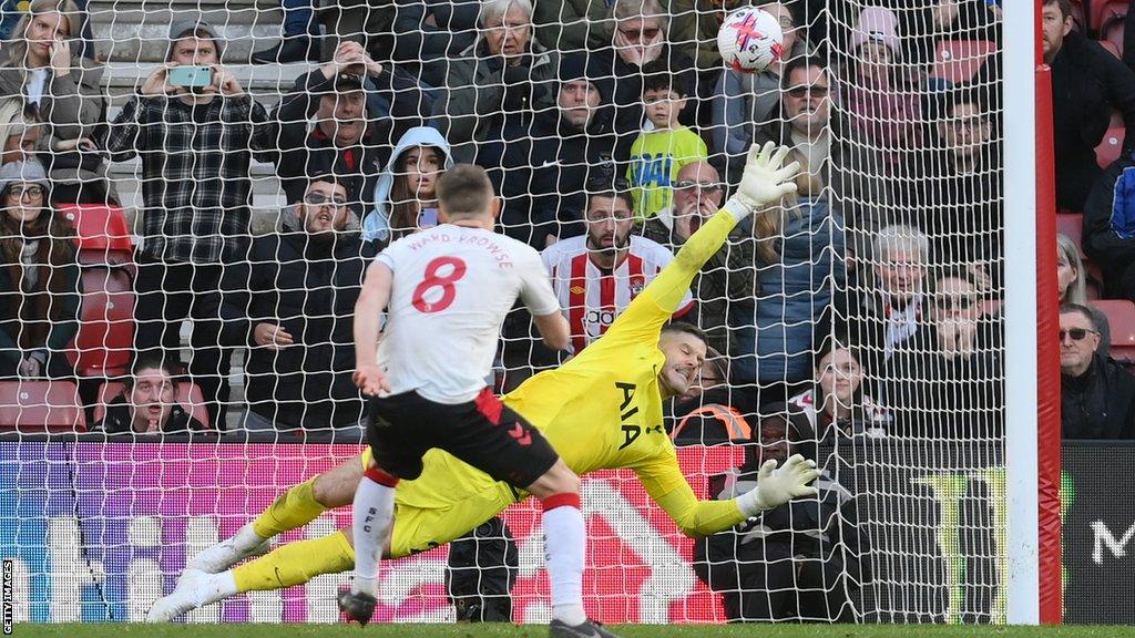 James Ward-Prowse scores his penalty against Fraser Forster