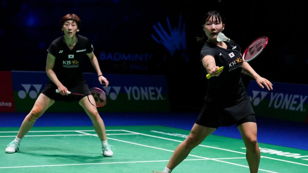 Baek Ha Na and Lee So Hee of Korea compete in the Women's Doubles