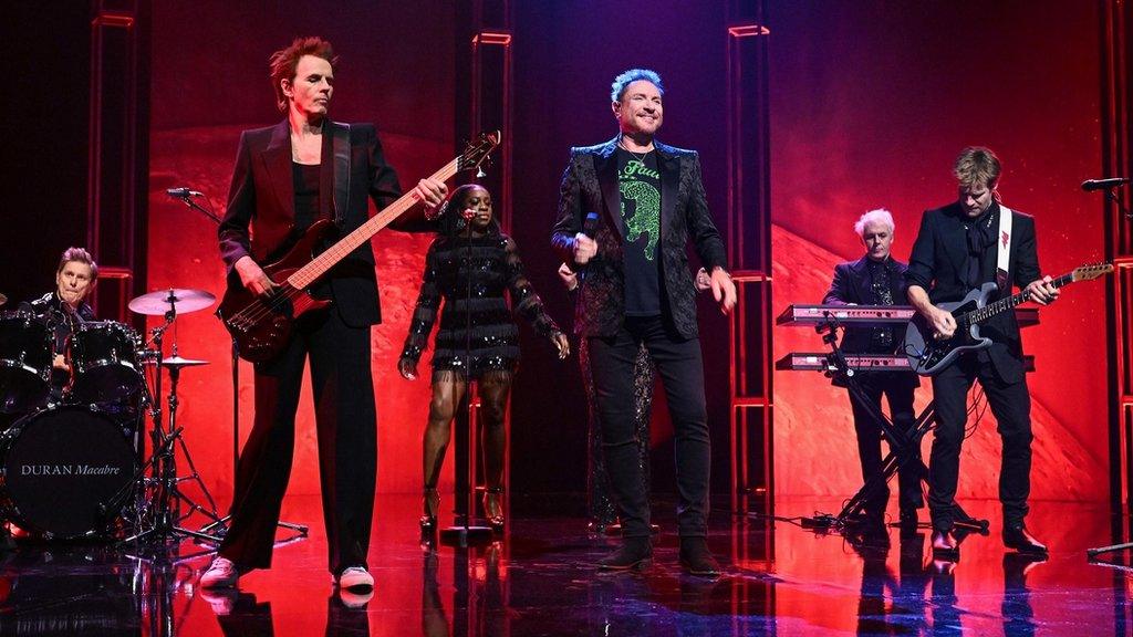 Duran Duran performing in a studio