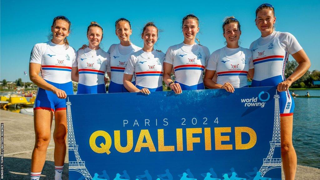 Annie Campbell-Orde (third from left) with the women's eight team-mates after they secured qualification for the Paris 2024 Olympics