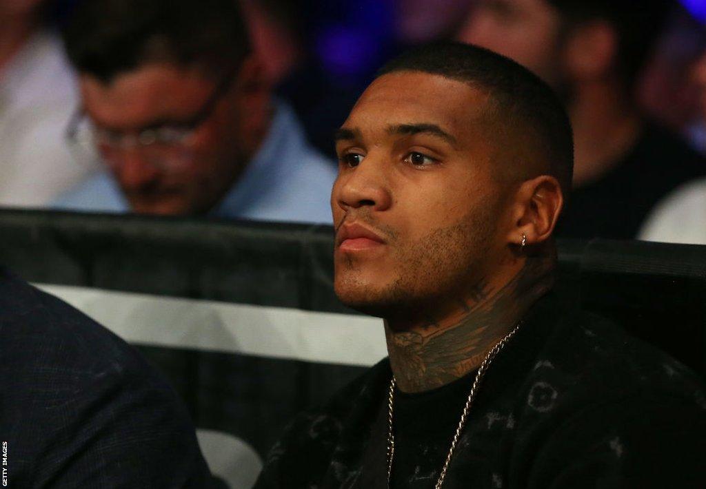 Conor Benn looking into the crowd at ringside