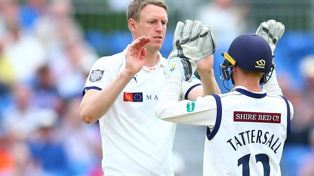 Yorkshire skipper Steve Patterson celebrates the first of his three wickets with keeper Jonny Tattersall