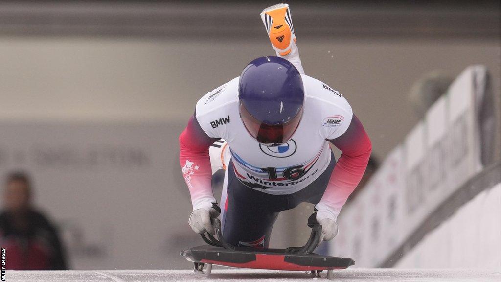 Craig Thompson jumps on the skeleton at a World Cup race in 2023