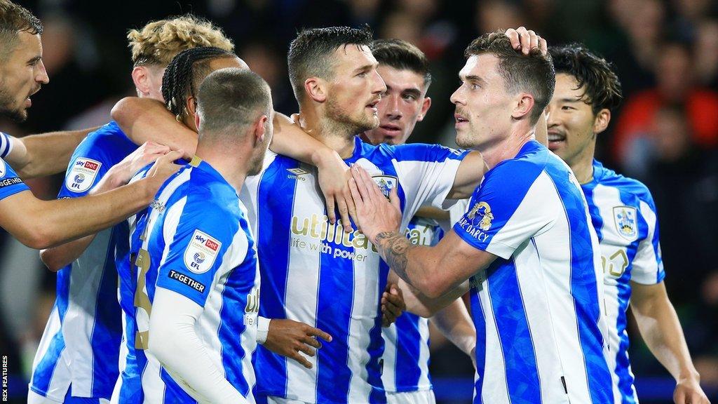 Matty Pearson celebrates the opening goal of the night at Huddersfield