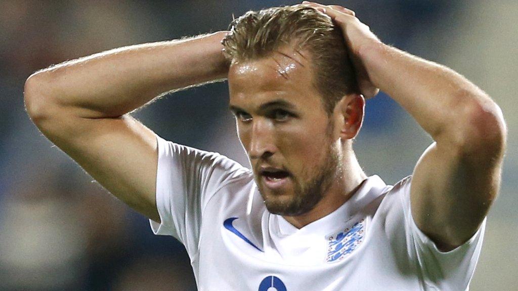 England striker Harry Kane looks dejected