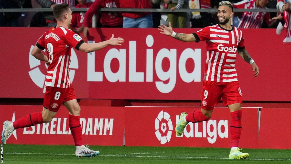 Taty Castellanos celebrates