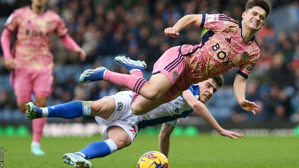 Leeds United's Dan James is fouled by Andrew Moran of Blackburn