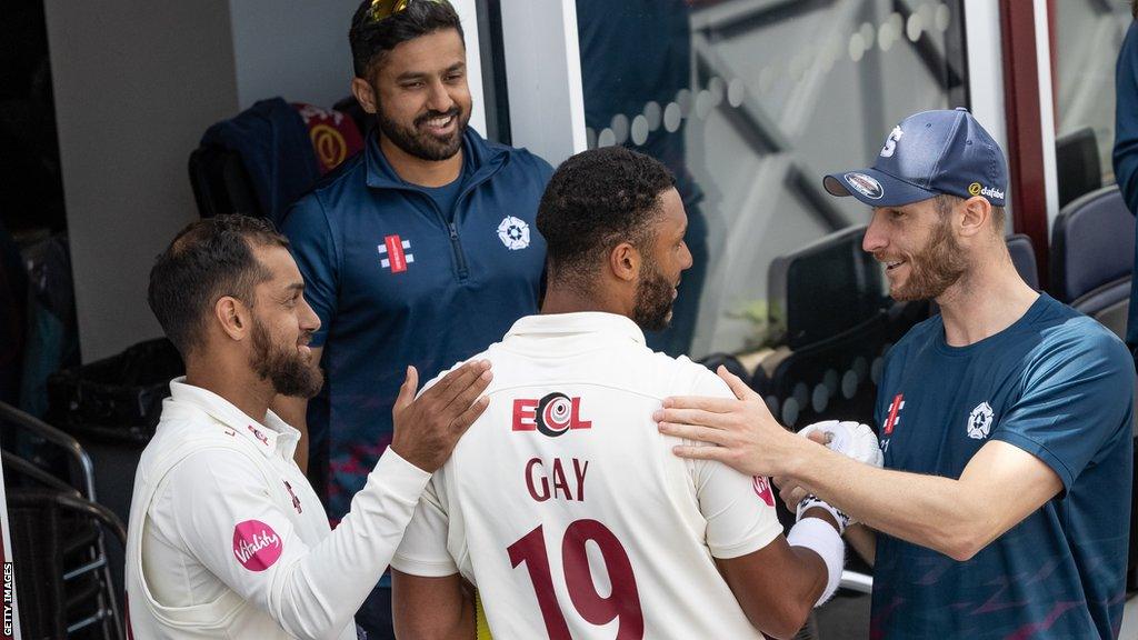 Emilio Gay congratulated by team-mates